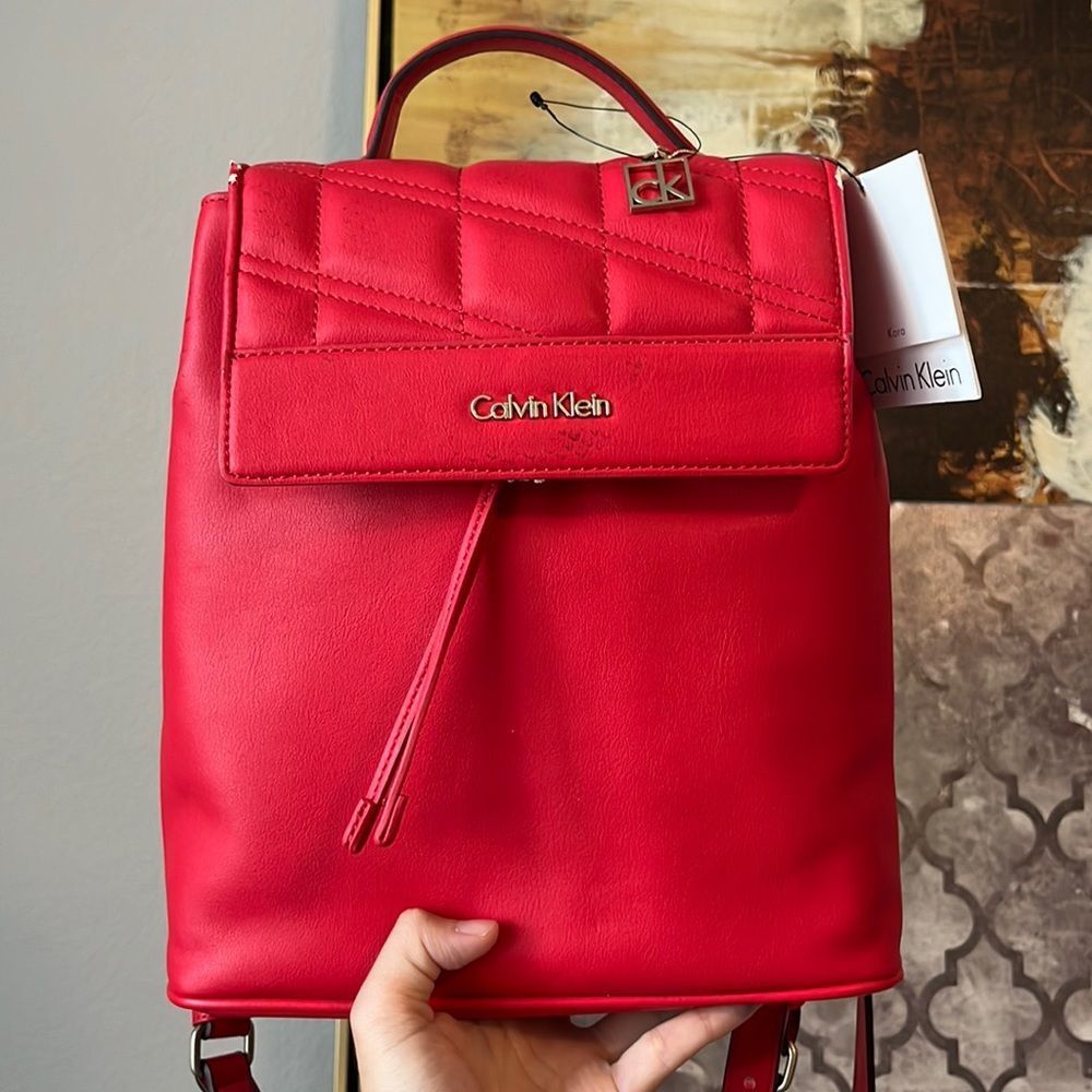 NWT Calvin Klein Womens Kora Studio Slim Backpack Bag Berry with scratches